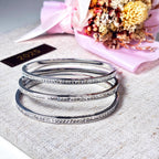 Dainty CZ Tennis Bangle Bracelet by Stella Amoré