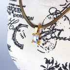 18K Gold Herringbone Snake Chain with Baguette Cut CZ Charm by Stella Amoré