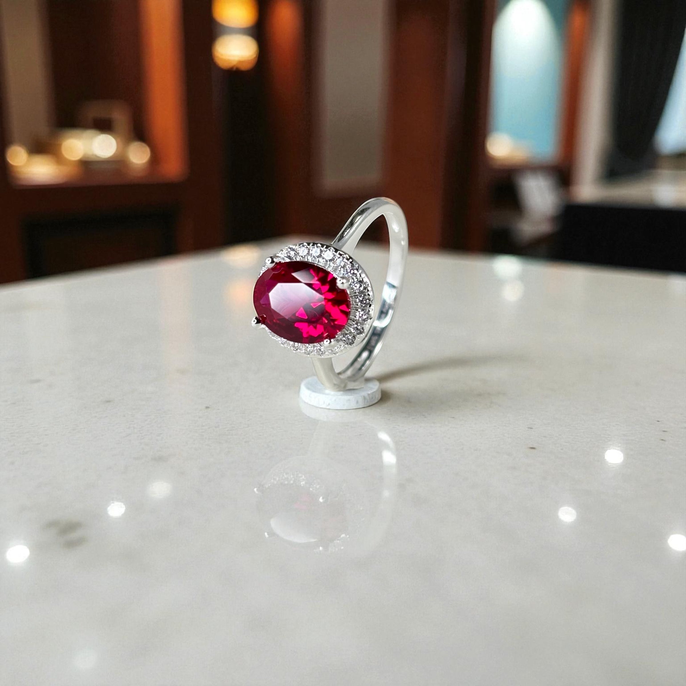 Oval Cut Halo Ring • Sterling Silver Ruby CZ Proposal Ring by Stella Amoré
