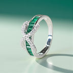 Emerald Baguette Cut Eternity Ring with Infinity Sign by Stella Amoré