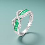 Emerald Baguette Cut Eternity Ring with Infinity Sign by Stella Amoré