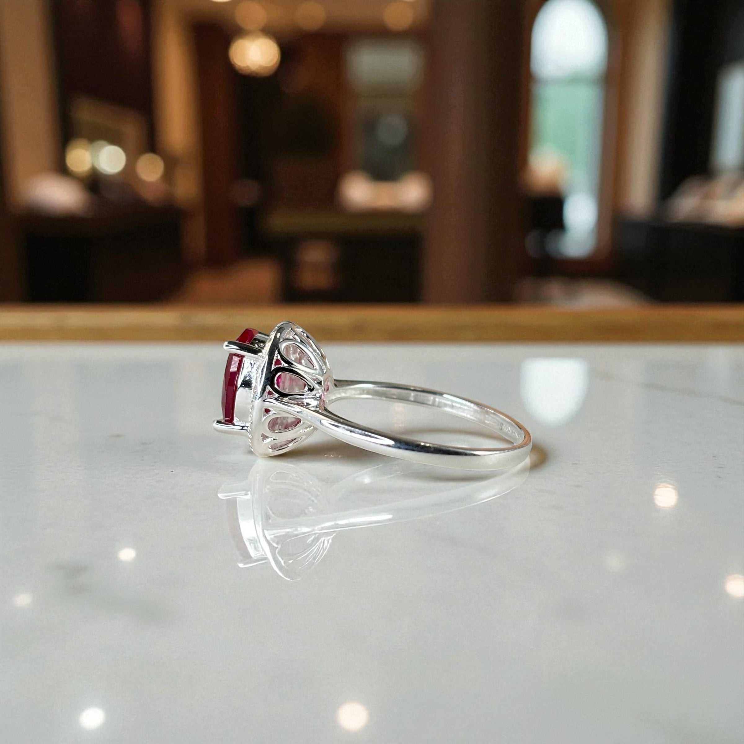Oval Cut Halo Ring • Sterling Silver Ruby CZ Proposal Ring by Stella Amoré
