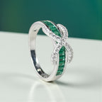 Emerald Baguette Cut Eternity Ring with Infinity Sign by Stella Amoré