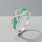Emerald Baguette Cut Eternity Ring with Infinity Sign by Stella Amoré
