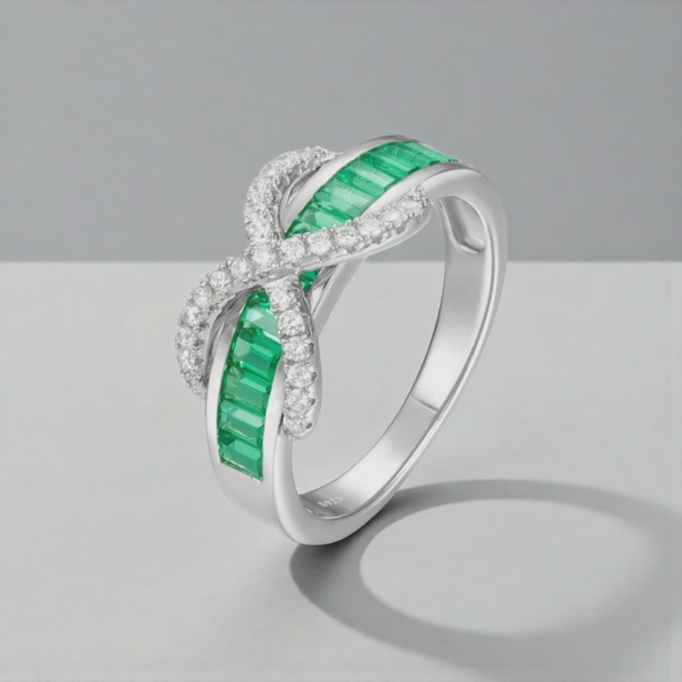 Emerald Baguette Cut Eternity Ring with Infinity Sign by Stella Amoré